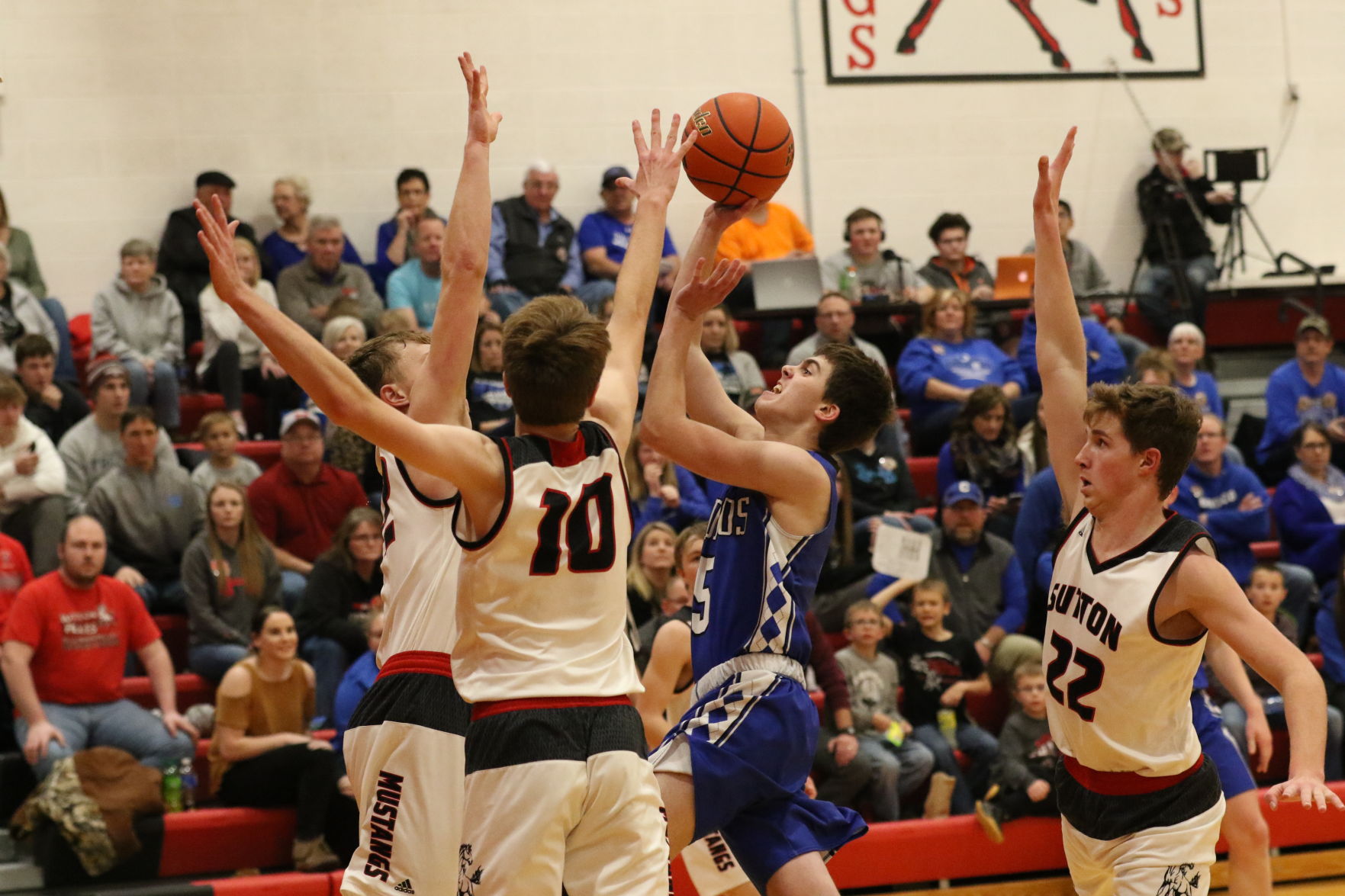 Centennial boys basketball at Sutton 19.JPG